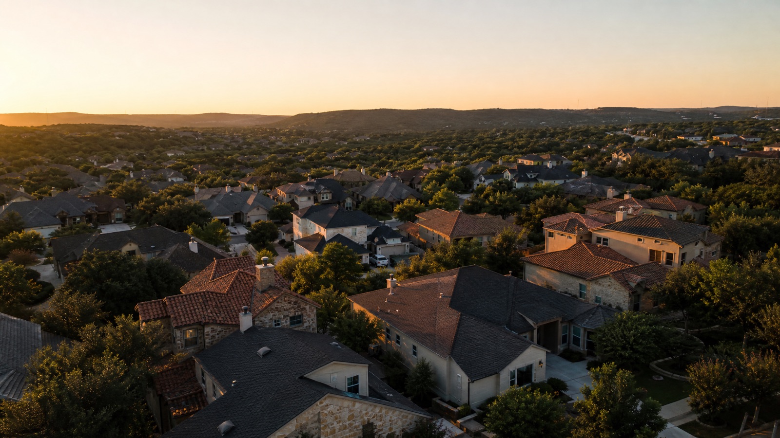 Aerial view of a completed roof on a Central Texas neighborhood home